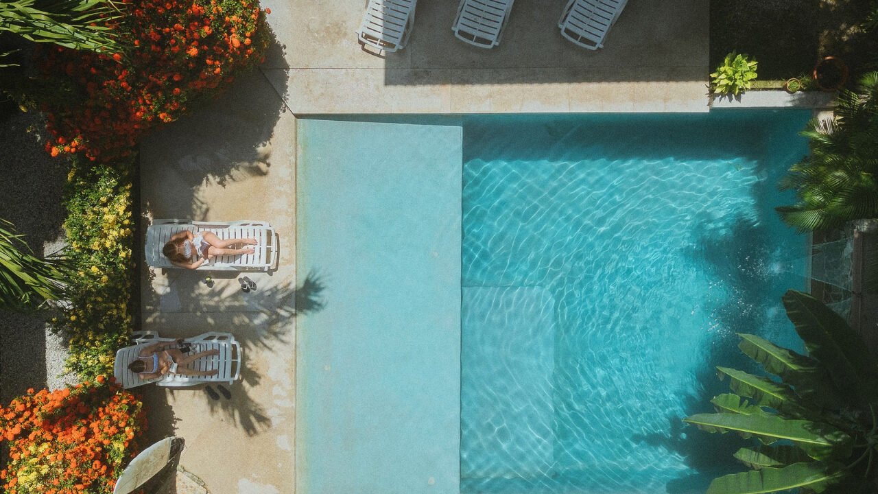 Aerial view of the pool and tropical garden at Principe del Pacifico